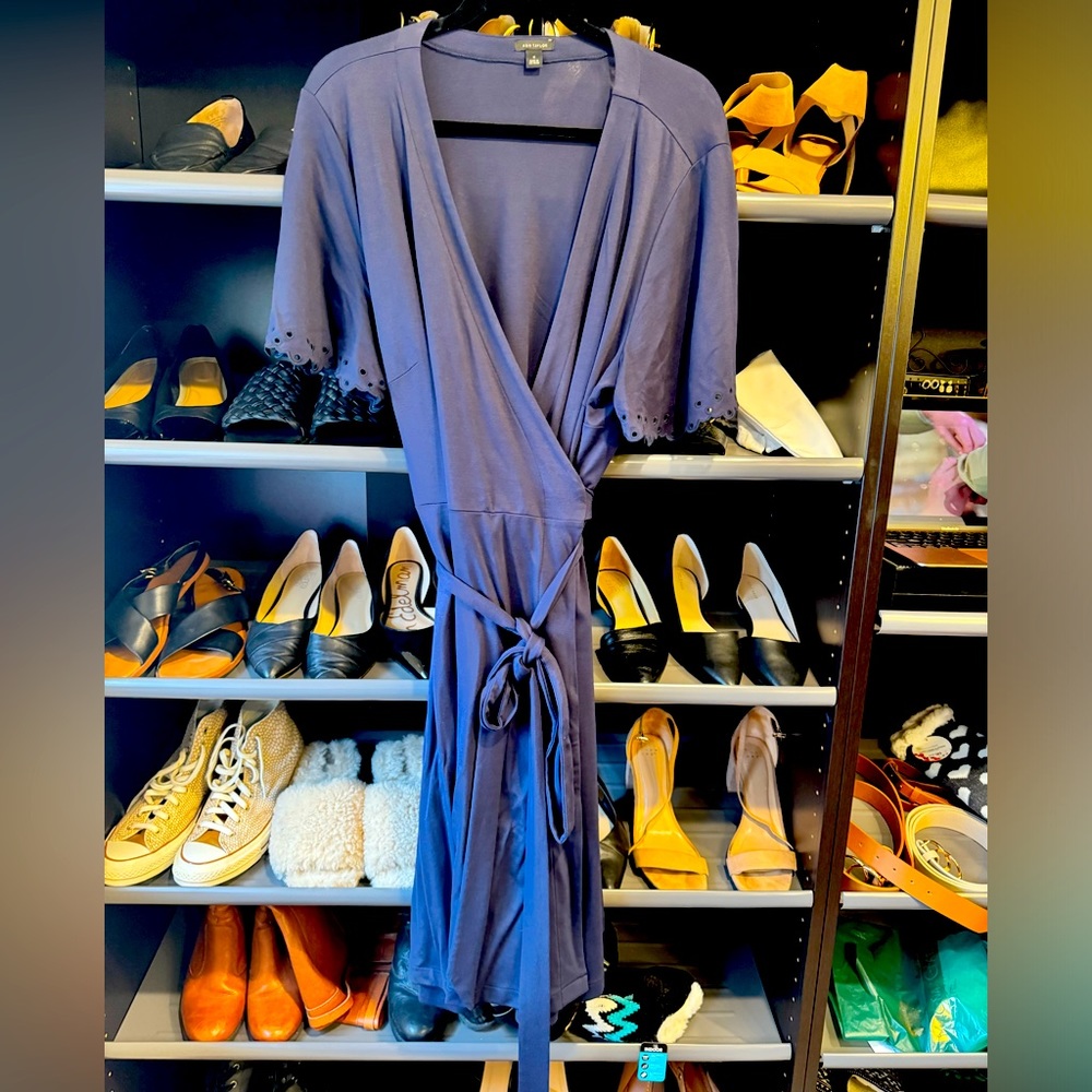 Like new! True wrap dress with laser cut sleeve detail!